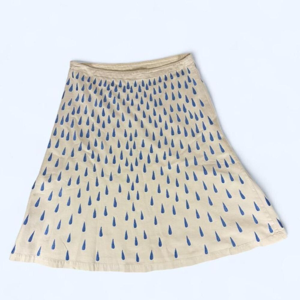 Contemporary Snak cream skirt with blue raindrop print